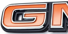 Load image into Gallery viewer, Trim Parts Tailgate Emblem 1981-1987 GMC Trucks With Brushed Aluminum Tailgate