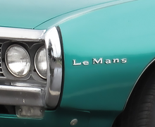 Load image into Gallery viewer, OER Chrome Quarter Panel or Front Fender Emblem For 1967-1969 Pontiac LeMans
